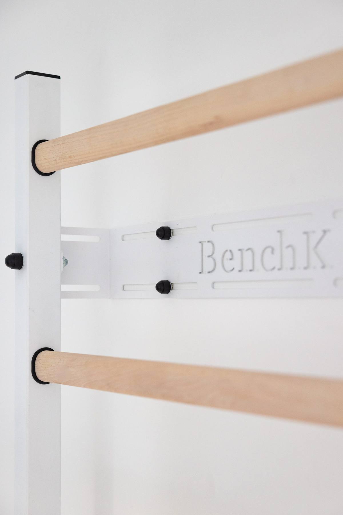 BenchK wall bar close-up showing FSC-certified beech wood rungs and precision engineering